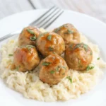 Delicious Honey Garlic Turkey Meatballs in a sticky sauce served with coconut rice.