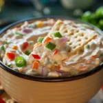 Creamy Boat Dip Rotel Ranch Dip served in a bowl with tortilla chips for dipping.