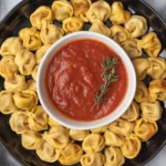 Crispy air fryer frozen tortellini without breading served in a bowl.