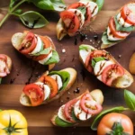 Delicious Caprese Bruschetta topped with tomato, mozzarella, and basil on toasted bread.
