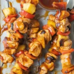 Delicious BBQ Pineapple Chicken Kabobs with grilled chicken, pineapple, peppers, and onion.
