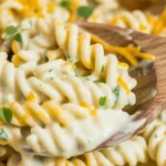 Delicious Cheesy Chicken Rotini Skillet with creamy sauce and pasta.