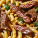 One-Pot Smoky Honey BBQ Steak Pasta with juicy steak and creamy sauce.