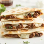 Delicious Steak and Cheese Quesadillas filled with steak and melted cheese