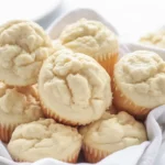 Platter of delicious Cream Cheese Muffins with a moist crumb and creamy filling.