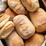 Homemade Ciabatta Bread fresh out of the oven, showcasing its airy and chewy texture.