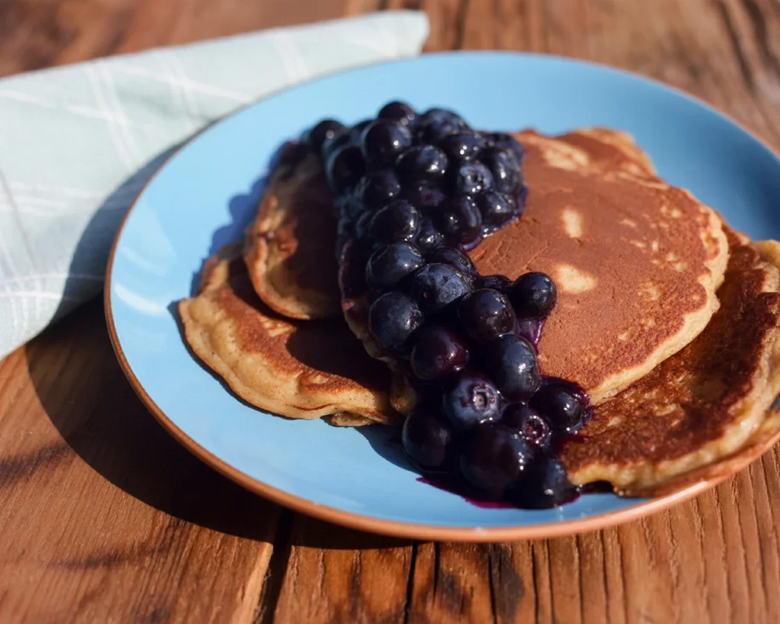 Delicious Huckleberry Maple Syrup Compote drizzled over pancakes and desserts.