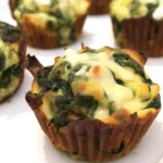 Delicious Spinach Pie Bites served as bite-sized appetizers filled with spinach and feta.